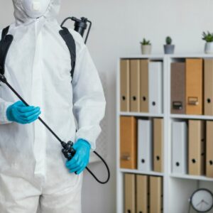 person-protective-suit-getting-ready-disinfect-room_23-2148848558